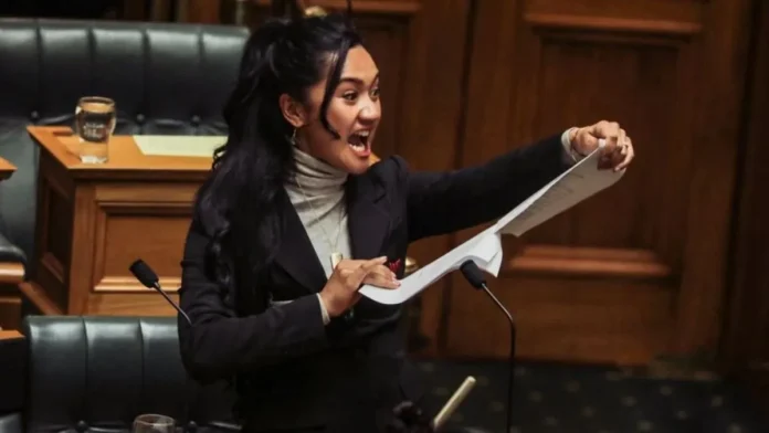 Haka Dance In New Zealand Parliament Young MP Hana Rauhiti Mypee Clarke Protest, Haka Dance In New Zealand Parliament, Young MP Hana Rauhiti Mypee Clarke Protest, New Zealand Parliament, New Zealand Parliament Protest, New Zealand Parliament News, New Zealand Parliament Updates, Latest New Zealand Parliament News, Parliament News New Zealand, Haka Dance, Hana Rauhiti Mypee Clarke, New Zealand, National News, International News, Live Updates, Breaking News, Headlines, Live News, Mango News, Mango News Telugu