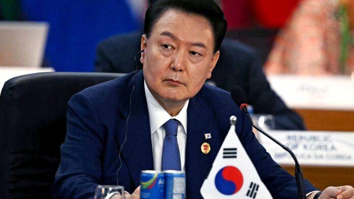 Public Outrage Over Martial Law South Korean President Yoon Suk Yeol Apologizes, Public Outrage, Martial Law, South Korean President, South Korean President Yoon Suk Yeol Apologizes, Suk Yeol Apologizes, Democratic Opposition Strength, Parliamentary Impeachment Vote, President Yoon Suk Yeol Apology, Public Backlash In South Korea, South Korea Martial Law Controversy, South Korea, South Korea Latest News, National News, International News, Live Updates, Breaking News, Live News, Mango News, Mango News Telugu