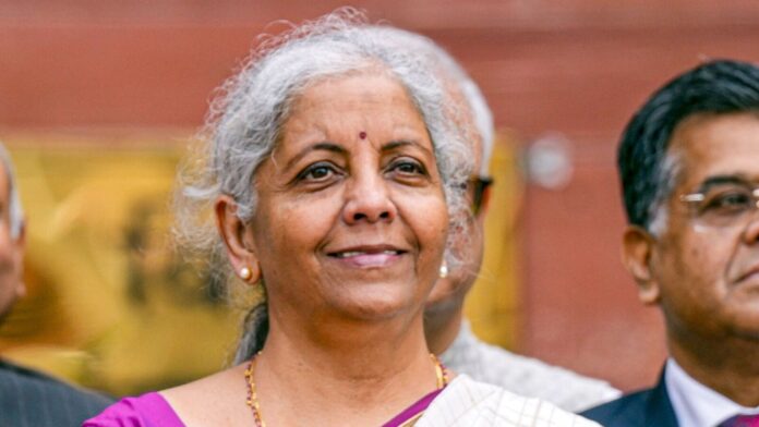 Special Attraction In The Budget Speech Nirmalammas Saree, Special Attraction In The Budget Speech, Budget 2025 Updates, Finance Minister Nirmala Sitharaman, Nirmalamma’s Saree, The Budget Speechv, Customs Duties, Import Tariffs, Price Changes, New Tax Changes, New Budget, Modi, BJP, Budget 2025, Income Tax, Nirmala Sitharaman, Tax Slabs, TDS Changes, India, National News, International News, Live Updates, Breaking News, Headlines, Live News, Political News, Mango News, Mango News Telugu