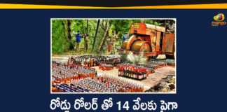Andhra Pradesh, Andhra Pradesh News, AP Liquor Bottles, AP Liquor Bottles News, Liquor Bottles Worth Rs 72 Lakh Being Destroyed by Road Roller, Police crush seized liquor bottles, Police destroys liquor bottles worth Rs 72 lakh, Seized liquor bottles worth Rs 72 lakh