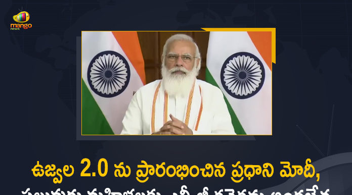 ఉజ్వల 2.0 ను ప్రారంభించిన ప్రధాని మోదీ, పలువురు మహిళలకు ఎల్పీజీ కనెక్షన్లు అందజేత LPG Connections to Several Women, Mango News, PM Modi, PM Modi Launches Ujjwala 2.0, PM Modi Launches Ujjwala 2.0 Hands over LPG Connections to Several Women, PM Modi launches Ujjwala Yojana 2.0, Ujjawala 2.0, Ujjawala 2.0 Launched, Ujjawala 2.0 Launched By PM, Ujjwala 2.0 Hands over LPG Connections to Several Women, ujjwala gas, ujjwala scheme, ujjwala scheme gas connection, ujjwala scheme upsc, ujjwala yojana 2021