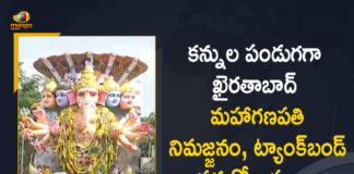 40-ft tall Khairatabad Ganesh idol immersed, Ganapathi Immersion, Ganapathi Immersion Celebrations, Hussain Sagar, Hyderabad, Hyderabad chants Ganpati Bappa Morya as Khairatabad idol immersed, Hyderabad: 40-ft tall Khairatabad Ganesh idol immersed, Immersion of Khairatabad Ganesh idol completed, Khairatabad Maha Ganapathi Immersion Completed, Khairatabad Maha Ganapathi Immersion Completed at Hussain Sagar, Mango News, telangana