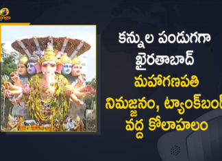 40-ft tall Khairatabad Ganesh idol immersed, Ganapathi Immersion, Ganapathi Immersion Celebrations, Hussain Sagar, Hyderabad, Hyderabad chants Ganpati Bappa Morya as Khairatabad idol immersed, Hyderabad: 40-ft tall Khairatabad Ganesh idol immersed, Immersion of Khairatabad Ganesh idol completed, Khairatabad Maha Ganapathi Immersion Completed, Khairatabad Maha Ganapathi Immersion Completed at Hussain Sagar, Mango News, telangana