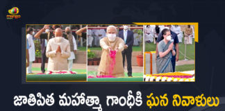 Gandhi Jayanti, Mahatma Gandhi at Rajghat, Mango News, Modi and Others Pay Tribute to Mahatma Gandhi, PM Modi, PM Modi And Others Pay Tribute To Mahatma Gandhi, PM Modi and Others Pay Tribute to Mahatma Gandhi at Raj Ghat, pm narendra modi, PM Narendra Modi pays tribute to Mahatma Gandhi at Rajghat, President Kovind, Raj Ghat, Tribute to Mahatma Gandhi