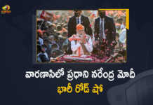 PM Modi Holds Massive Roadshow In Varanasi Ahead Of Last Phase Of Polling In Uttar Pradesh, PM Modi Holds Massive Roadshow In Varanasi, PM Modi Holds Massive Roadshow, PM Modi, Narendra Modi, Prime Minister of India, Uttar Pradesh Assembly Elections-2022 Fifth Phase Voting Underway in 57 Constituencies, Fifth Phase Voting Underway in 57 Constituencies, Uttar Pradesh Assembly Elections-2022, Fifth Phase Voting Underway in 57 Constituencies Today, Uttar Pradesh Assembly Fifth Phase Voting Underway in 57 Constituencies Today, Assembly election 2022 live updates, Assembly election 2022 Latest updates, Assembly election 2022 Latest News, Uttar Pradesh Assembly Elections 2022, Polling to Held in 57 Constituencies in Fifth Phase Polling Underway, Polling to Held in 57 Constituencies, Uttar Pradesh Assembly Elections 2022 Polling to Held in 57 Constituencies, Uttar Pradesh Election 2022, 2022 Uttar Pradesh Election, Uttar Pradesh, Uttar Pradesh Assembly Elections 2022, 2022 Uttar Pradesh Assembly Elections, Uttar Pradesh Assembly Elections, Uttar Pradesh Assembly Elections Latest News, Uttar Pradesh Assembly Elections Latest Updates, Uttar Pradesh Assembly Elections Live Updates, 2022 Assembly Elections, Assembly Elections, Elections, Mango News, Mango News Telugu,