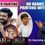 Mouth Painting of Ram Charan And Jr NTR By Specially-Abled Boy - Dr Harrsha Artist, Hard Work Never Fails Ram Charan And Jr Ntr Painting With Mouth,Ram Charan Painting With Mouth,keeravaani songs,jr ntr drawing, ram charan pencil sketch,ram charan drawing,rrr video song,jr ntr pencil sketch,ss rajamouli rrr,keeravaani rrr,rrr movie, rrr songs,rrr telugu songs,ntr,ram charan,alia bhatt,ntr rrr songs,ram charan rrr songs,rrr telugu movie,rrr telugu movie songs, rrr songs telugu,rrr video songs,rrr video songs telugu,jr ntr, Mango News, Mango News Telugu,