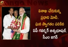PM Modi Reaches Vizag AP Governor Biswabhusan and CM YS Jagan Welcomes in Grand Way, AP Governor Biswabhusan and CM YS Jagan Welcomes in Grand Way, PM Modi Reaches Vizag, AP Governor Biswabhusan, Governor Biswabhusan, AP CM YS Jagan Mohan Reddy, PM Modi in Vizag Public Meeting, AP CM YS Jagan Mohan Reddy, PM Narendra Modi Two-Day Visit, PM Narendra Modi Participates in Huge Road Show at Visakhapatnam, Huge Road Show at Visakhapatnam, PM Modi at Vizag, PM Modi Vizag Tour, PM Modi Vizag Visit, PM Modi in Visakhapatnam, Prime Minister Narendra Modi, Narendra Modi, PM Narendra Modi in Visakhapatnam, PM Modi Vizag Tour News, PM Modi Vizag Tour Latest News And Updates, PM Modi Vizag Tour Live Updates, Mango News, Mango News Telugu