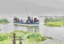 Kolleru Faces Budameru Threat.. Transportation Halted For 9 Villages, Kolleru, Yeleru Receive Heavy Inflows, Kolleru Lake, Water level in Kolleru Lake, 9 Villages Blocked, Budameru Floods, Kolleru Budameru Flood Gandam, Traffic, Rain Alert, Officials Have Been Alerted, Heavy Rain Are Falling Across AP, Heavy Rain In AP, Weather Report, Red Alert, AP, Heavy Rain, Andhra Pradesh, AP Rains, AP Live Updates, Political News, Mango News, Mango News Telugu